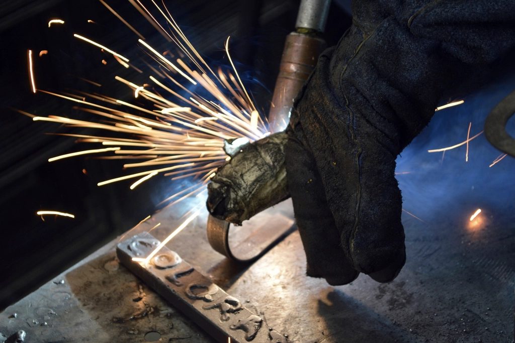 Metal being ground and finished in a workshop